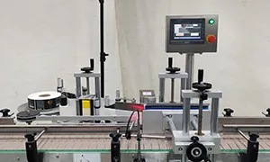 Étiqueteuse automatique pour bouteilles rondes