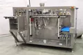 Ensacheuse horizontale pour sachets préformés en granulés