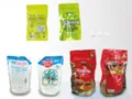 Ensacheuse horizontale pour sachets préformés en poudre